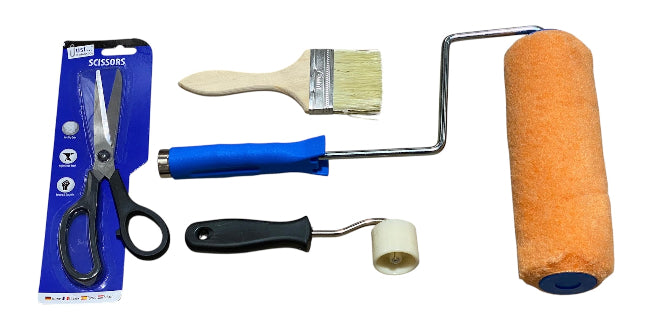 Set of painting tools including scissors, paintbrush, and rollers on a white background